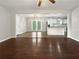 Open concept living space with hardwood floors, and a seamless transition to the kitchen at 3653 Mecklinburg Pl, Decatur, GA 30032