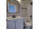 Bathroom featuring a white vanity, toilet, and a shower-tub combination at 1700 Conductor Ln, Conyers, GA 30013