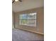 Bedroom with large windows that provide ample natural light at 1700 Conductor Ln, Conyers, GA 30013
