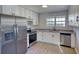 Kitchen with stainless appliances, modern cabinets, and great countertop space at 1700 Conductor Ln, Conyers, GA 30013