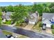 Beautifully landscaped front yard complements this two-story home with a two-car garage and inviting curb appeal at 449 Highlands Loop, Woodstock, GA 30188