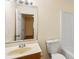 Bathroom vanity with one sink, toilet and bathtub/shower combo at 6939 Waters Edge Dr, Stone Mountain, GA 30087