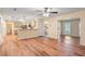 Open-concept layout with views of the kitchen, dining area, and staircase at 6939 Waters Edge Dr, Stone Mountain, GA 30087