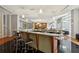 Stylish bar area featuring countertops, bar stools, and modern lighting at 711 Cosmopolitan Ne Dr # 123, Atlanta, GA 30324