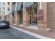 Stylish building entrance with brick columns and visible street access at 711 Cosmopolitan Ne Dr # 123, Atlanta, GA 30324