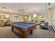 Relax in the community game room with a pool table and comfortable seating at 711 Cosmopolitan Ne Dr # 123, Atlanta, GA 30324