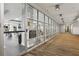 Bright community gym featuring an array of equipment behind glass walls in well lit, spacious room at 711 Cosmopolitan Ne Dr # 123, Atlanta, GA 30324