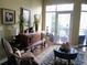 Comfortable room boasts natural light, a decorative rug and tasteful furnishings, creating a welcoming space at 711 Cosmopolitan Ne Dr # 123, Atlanta, GA 30324