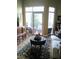 Relaxing living area with balcony access, stylish rug, and comfortable seating, perfect for unwinding at 711 Cosmopolitan Ne Dr # 123, Atlanta, GA 30324