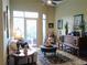 Cozy living room with vaulted ceilings, a balcony, comfortable furniture, and charming decor at 711 Cosmopolitan Ne Dr # 123, Atlanta, GA 30324