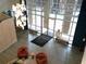 Overhead view of a stylish lobby with large windows and comfortable seating area at 711 Cosmopolitan Ne Dr # 123, Atlanta, GA 30324