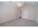 Bedroom featuring vaulted ceilings, carpeted floors, and access to en-suite bathroom at 1022 Pecan Grove Pl, Lawrenceville, GA 30046