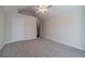 Spacious bedroom showcasing soft neutral walls and a plush carpet at 1022 Pecan Grove Pl, Lawrenceville, GA 30046