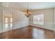 Dining room with hardwood floors and wainscoting at 1022 Pecan Grove Pl, Lawrenceville, GA 30046