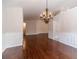 Dining room featuring hardwood floors and wainscoting at 1022 Pecan Grove Pl, Lawrenceville, GA 30046