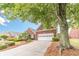 Lovely single-story brick house with attached two-car garage and beautiful front yard landscaping at 1022 Pecan Grove Pl, Lawrenceville, GA 30046