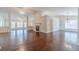 Spacious living room with hardwood floors, fireplace, and plenty of natural light at 1022 Pecan Grove Pl, Lawrenceville, GA 30046