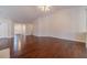 Expansive living room with beautiful hardwood floors and access to entry at 1022 Pecan Grove Pl, Lawrenceville, GA 30046