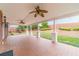 Covered patio with brick flooring and classic white pillars at 1022 Pecan Grove Pl, Lawrenceville, GA 30046