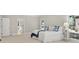Bright bedroom features neutral walls, large windows, and white bedding at 1585 Lazy River Ln, Sandy Springs, GA 30350