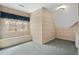 Bonus room featuring blue carpet, patterned wallpaper, and a window seat at 1585 Lazy River Ln, Sandy Springs, GA 30350