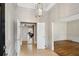 Elegant foyer with tile flooring, classic molding, and a view into other rooms at 1585 Lazy River Ln, Sandy Springs, GA 30350
