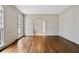 Bright and spacious living room with hardwood floors, trim, and lots of natural light at 1585 Lazy River Ln, Sandy Springs, GA 30350