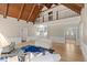 Inviting living room with elegant built-ins, a cozy seating area, and hardwood floors at 1585 Lazy River Ln, Sandy Springs, GA 30350