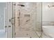 Modern shower with glass door and bronze fixtures at 1585 Lazy River Ln, Sandy Springs, GA 30350