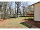 Lush backyard featuring a raised wooden deck, perfect for enjoying the natural surroundings at 1598 Kings Rd, Marietta, GA 30062
