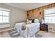Bedroom with wood accent wall and modern finishes offering a comfortable and stylish retreat at 1598 Kings Rd, Marietta, GA 30062