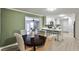 Open-concept kitchen with an island, stainless steel appliances, and eat-in dining area at 1598 Kings Rd, Marietta, GA 30062