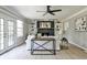 Inviting living room with fireplace, built-in bookshelves, french doors and plenty of natural light at 1598 Kings Rd, Marietta, GA 30062