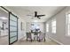 Bright office space with natural light and views to the kitchen through modern sliding barn doors at 1598 Kings Rd, Marietta, GA 30062