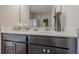 Bathroom featuring double sinks with modern fixtures and a tiled shower at 207 Cherokee Reserve Cir, Canton, GA 30115