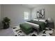 Stylish bedroom decorated with large abstract art, accent ottoman, and indoor plant at 207 Cherokee Reserve Cir, Canton, GA 30115
