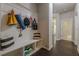 Hallway featuring a convenient mudroom area with storage bench and hooks at 207 Cherokee Reserve Cir, Canton, GA 30115