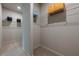 Walk-in closet with lots of storage, shelving and carpeting at 207 Cherokee Reserve Cir, Canton, GA 30115