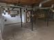 Unfinished basement with exposed ducts and support beams at 2555 Angus Sw Ct, Marietta, GA 30008