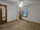 Bedroom with carpeted floors, a window and a door leading to the bathroom at 2555 Angus Sw Ct, Marietta, GA 30008
