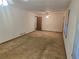 Bright living room offering neutral paint, wall trim, carpet, and a ceiling fan for comfortable living at 2555 Angus Sw Ct, Marietta, GA 30008