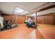 Basement features a recreation area, wood paneling, drop ceiling, and a workout space at 3955 Old Fairburn Sw Rd, Atlanta, GA 30331