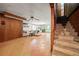Finished basement area with stairs, a ceiling fan, and a comfortable seating area at 3955 Old Fairburn Sw Rd, Atlanta, GA 30331