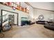 Open living room featuring high ceilings, large windows, and cozy seating area with aquarium at 3955 Old Fairburn Sw Rd, Atlanta, GA 30331