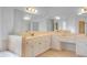 Bright bathroom features dual sinks with a vanity area and large mirror at 1168 Woodtrace Ln, Auburn, GA 30011
