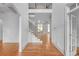 Bright foyer with high ceilings, wood floors, and a beautiful staircase at 1168 Woodtrace Ln, Auburn, GA 30011