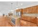 Kitchen with stainless appliances and a kitchen island at 1168 Woodtrace Ln, Auburn, GA 30011