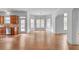 Open concept living area with hardwood floors and natural light at 1168 Woodtrace Ln, Auburn, GA 30011