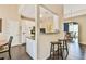 Modern kitchen with breakfast bar, granite counters and stainless steel appliances at 1719 Kings Cross Ct, Hoschton, GA 30548