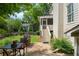Backyard patio with outdoor dining area and BBQ grill, perfect for entertaining at 400 Fieldstone Lndg, Alpharetta, GA 30005